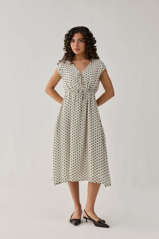 The Drawstring Waist Midi Dress in Polka made by Reistor