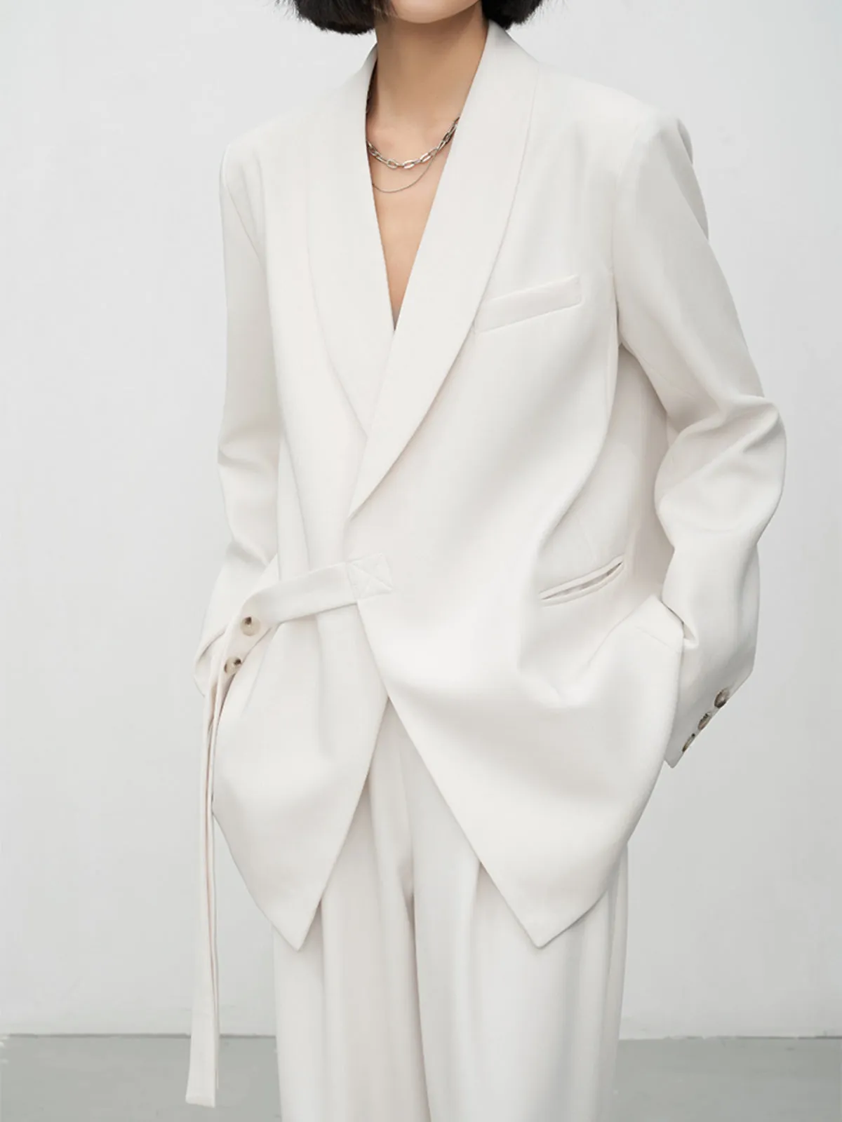 Asymmetric Buttoned Structured Blazer sold by COMMENSE
