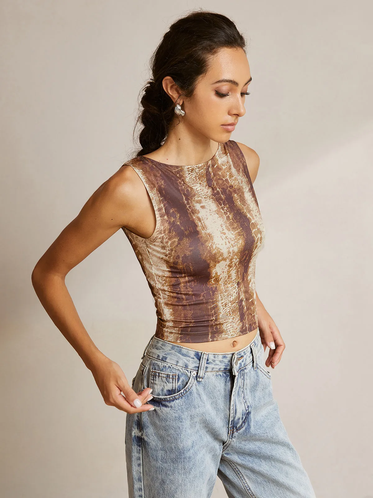 Printed Sleeveless Crew Neck Blouse sold by COMMENSE