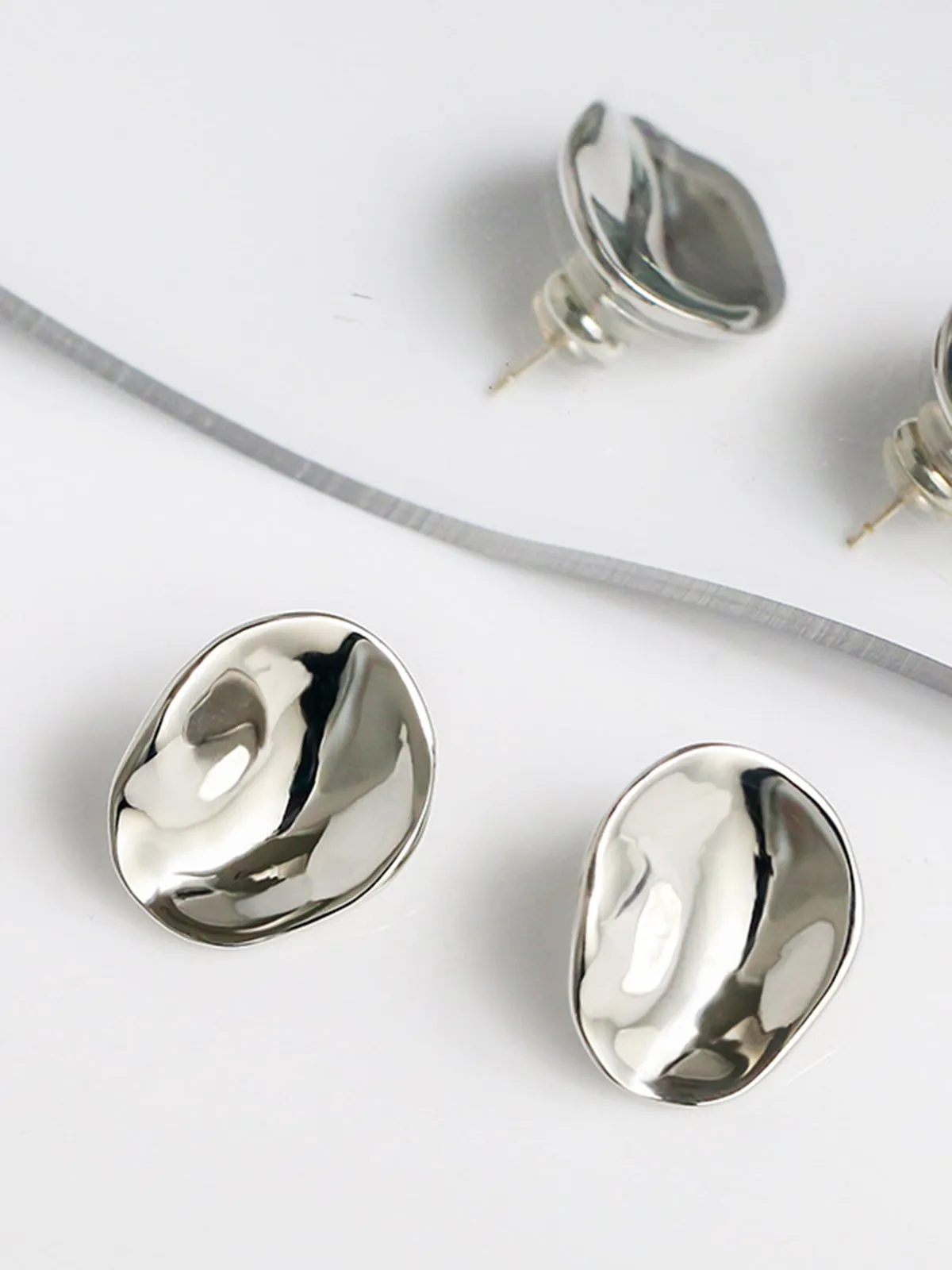 Dimensions Earrings sold by COMMENSE