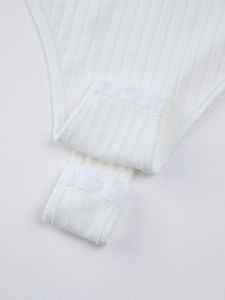 White Textured Bodysuit sold by COMMENSE
