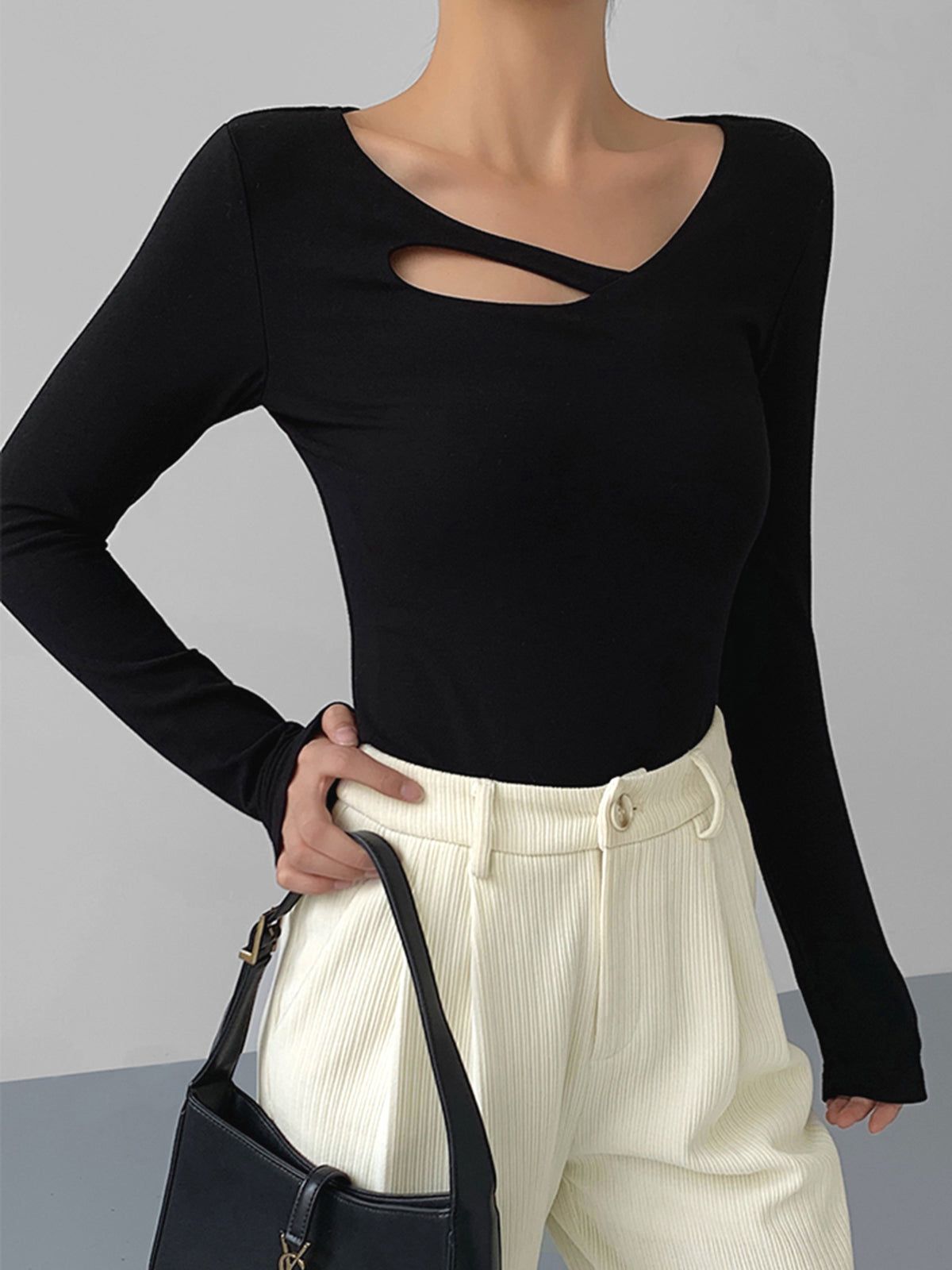 Cosmopolitan Cutout Long Sleeve Shirt sold by COMMENSE