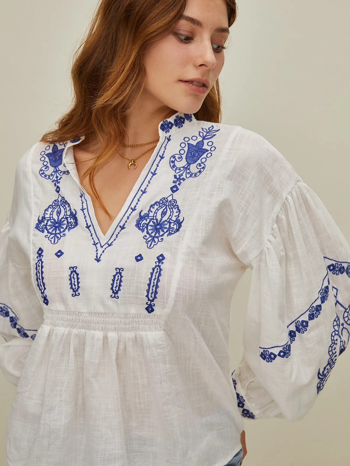 Embroidered V-Neck Shirt sold by COMMENSE