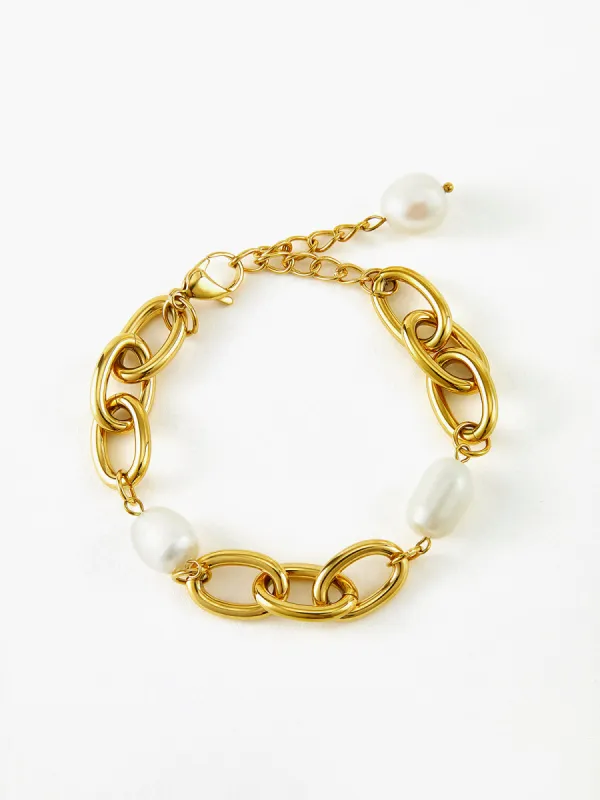 Oval Pearl Golden Chain Bracelet sold by COMMENSE