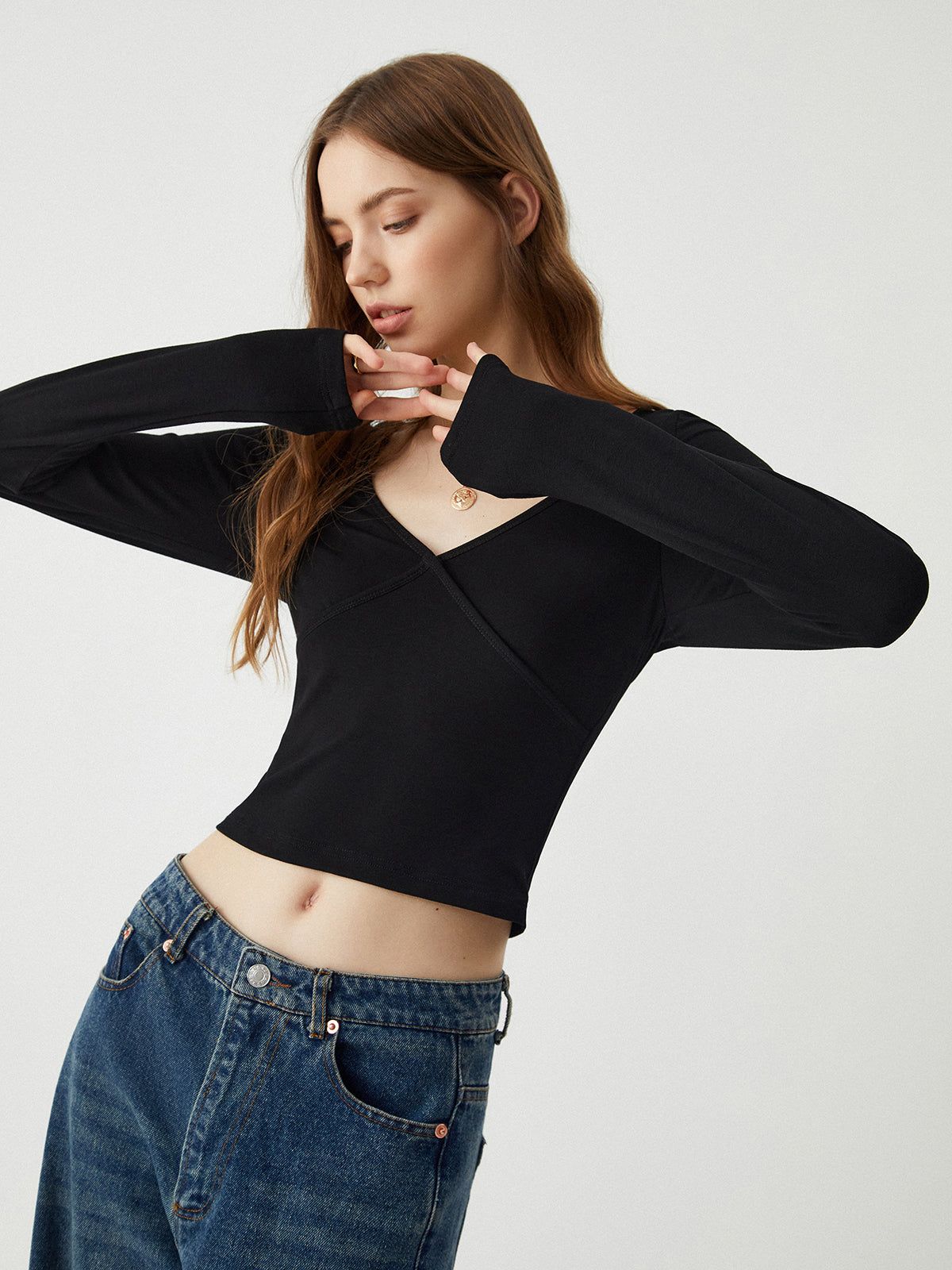 Solid Open Back Tied Cross Long Sleeve Crop Top sold by COMMENSE
