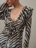Mesh Ruffle Detail Knotted Top sold by COMMENSE