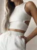 Solid Back Cutout Crop Tank Top sold by COMMENSE