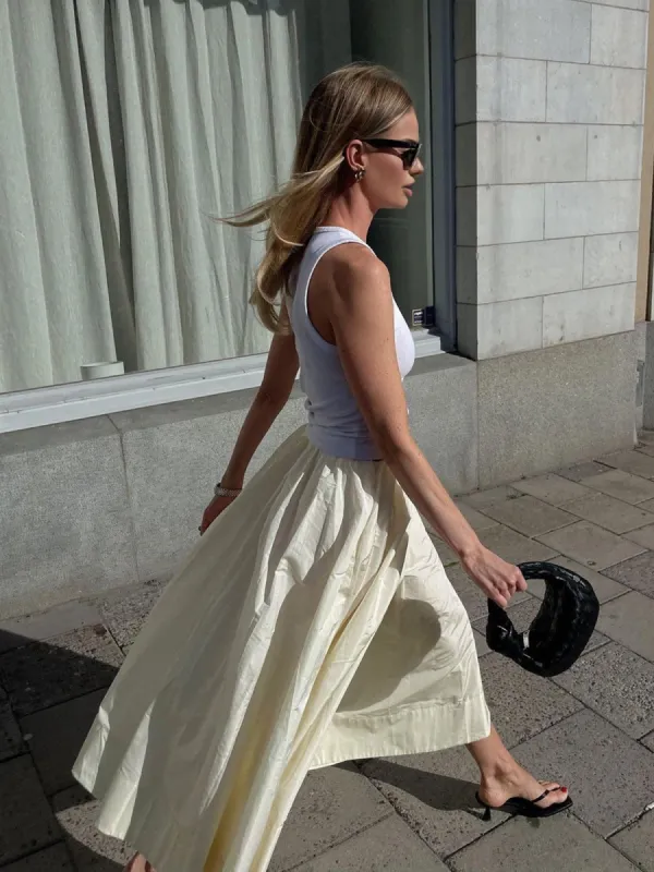 Creamy Leisure Midi Skirt sold by COMMENSE