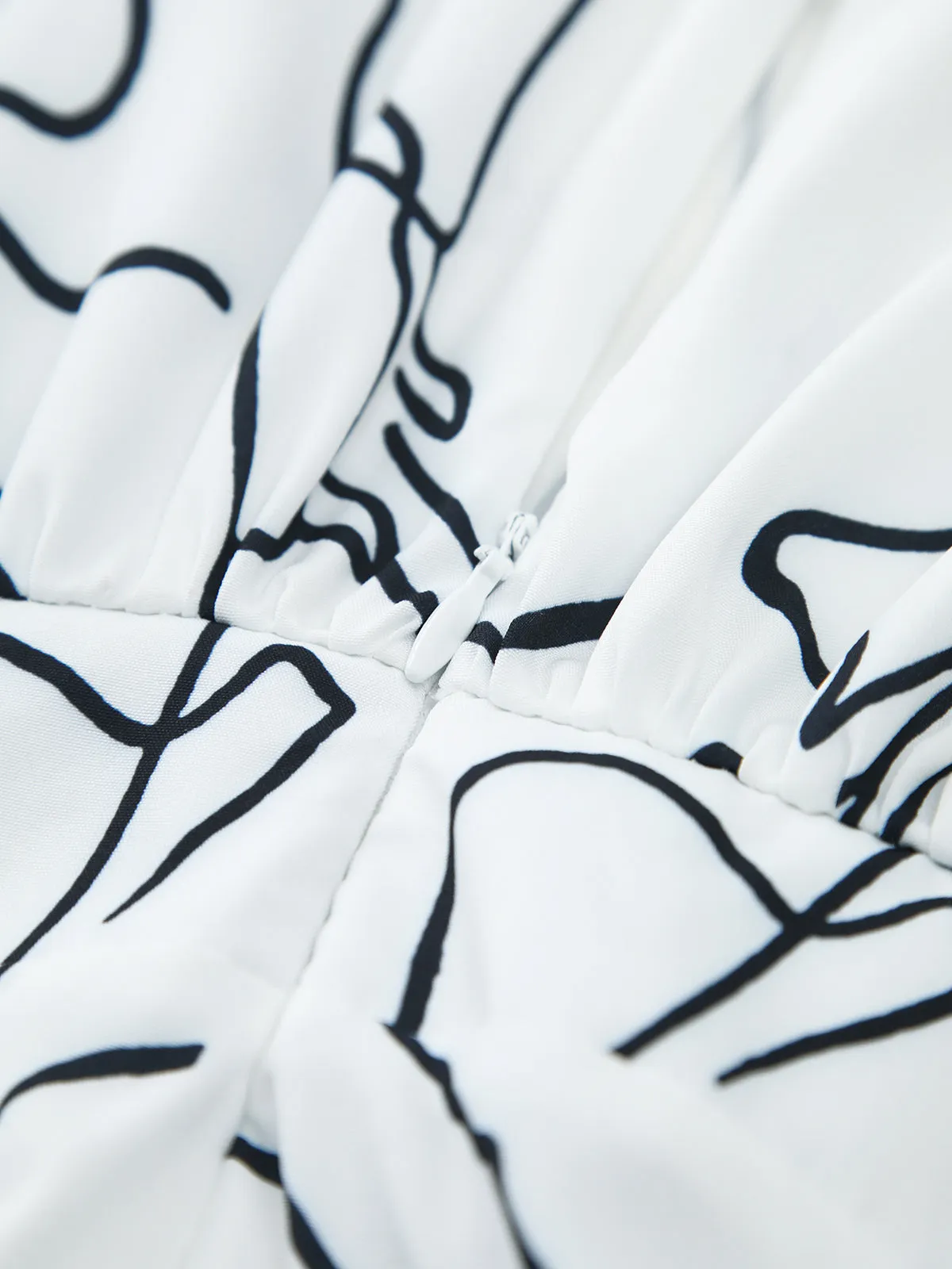 Irregular Print Tie Neck Halter Jumpsuit sold by COMMENSE product image thumbnail 3