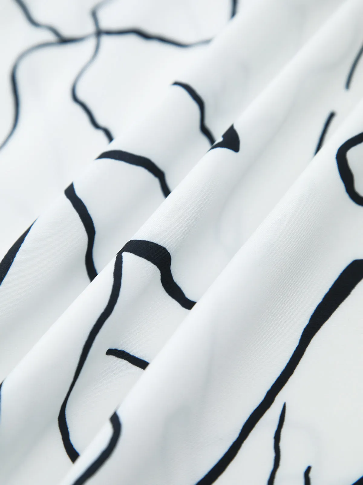 Irregular Print Tie Neck Halter Jumpsuit sold by COMMENSE product image thumbnail 4