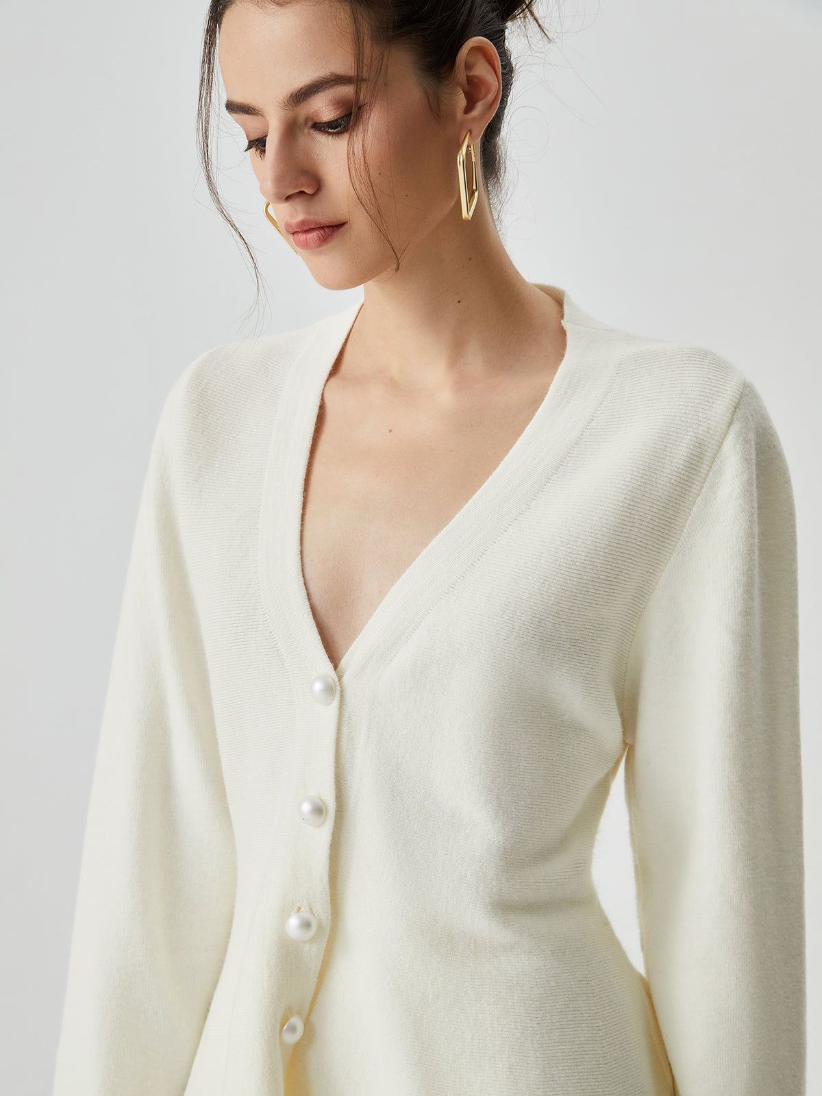 Solid Ruffle Hem V-neck Pearl Button Knit Sweater sold by COMMENSE product image thumbnail 4