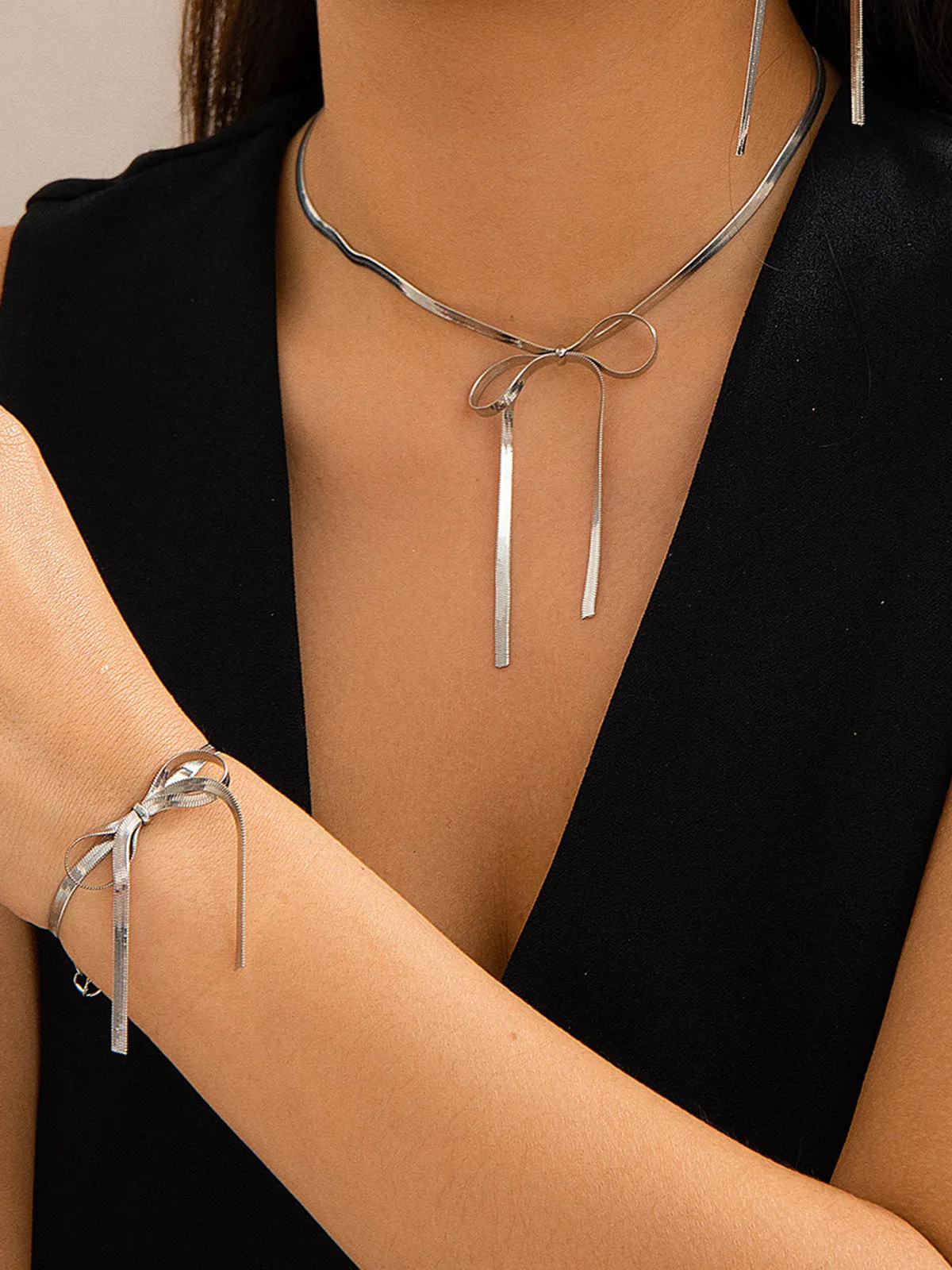Bow Tassel Necklace Bracelet Set sold by COMMENSE