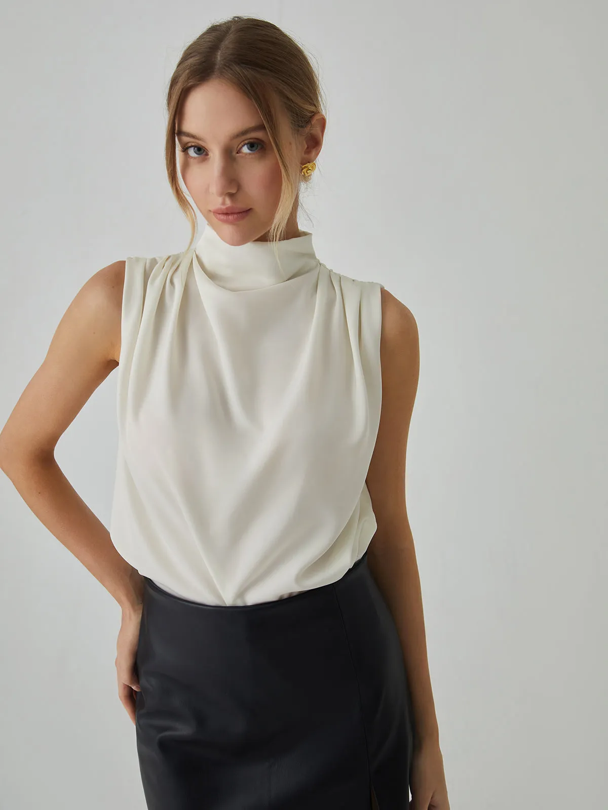 Pleated High Neck Sleeveless Blouse sold by COMMENSE