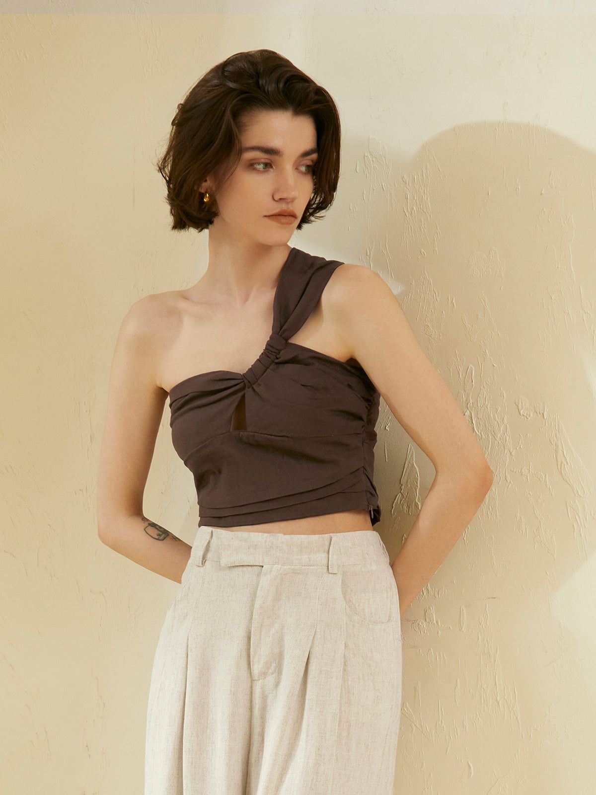 Asymmetrical Twist Linen Crop Top sold by COMMENSE