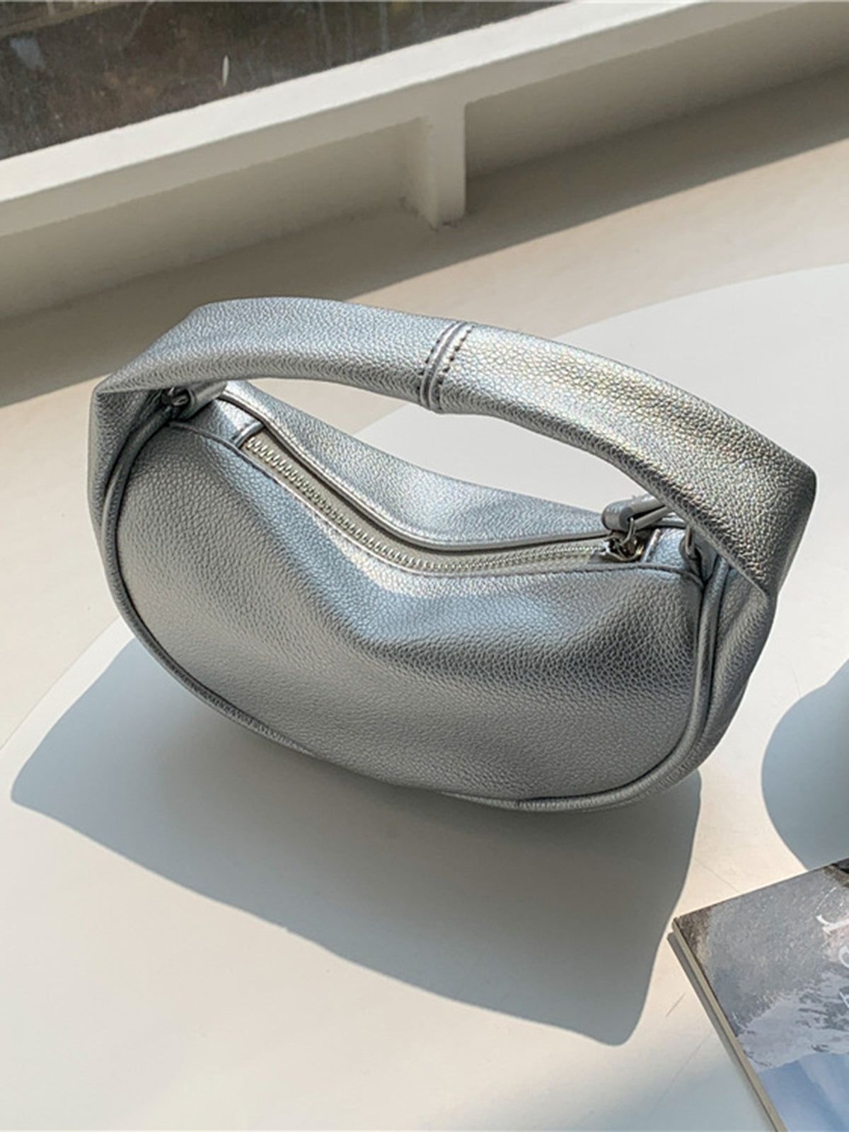 Metallic Leather Handbag sold by COMMENSE
