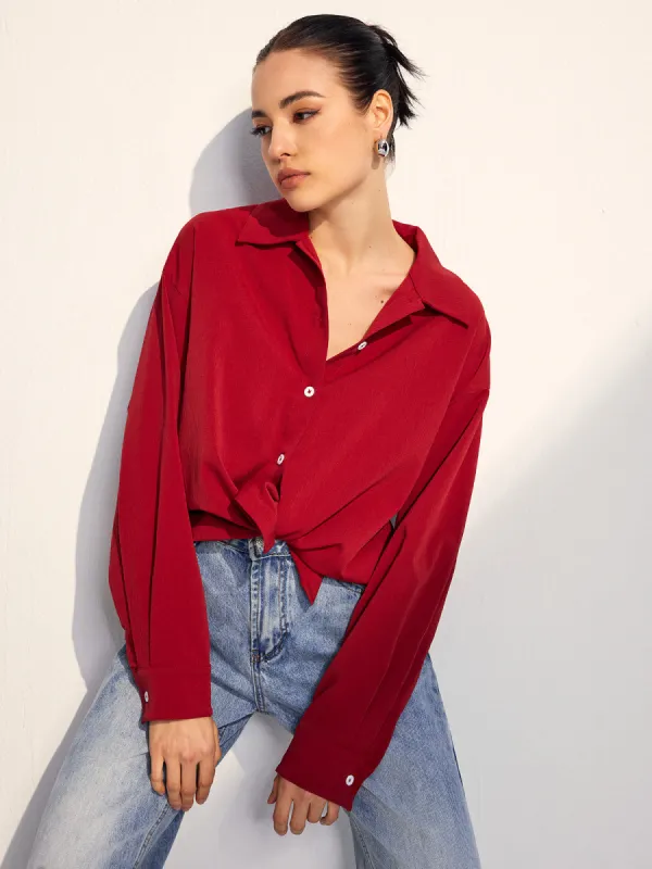 Solid Lapel Button Draped Shirt sold by COMMENSE