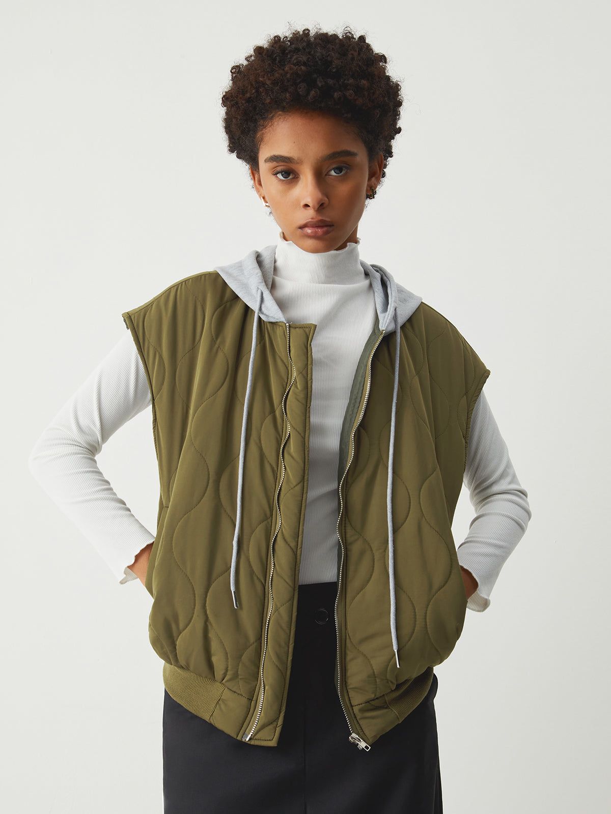 Hooded Patchwork Quilted Vest sold by COMMENSE