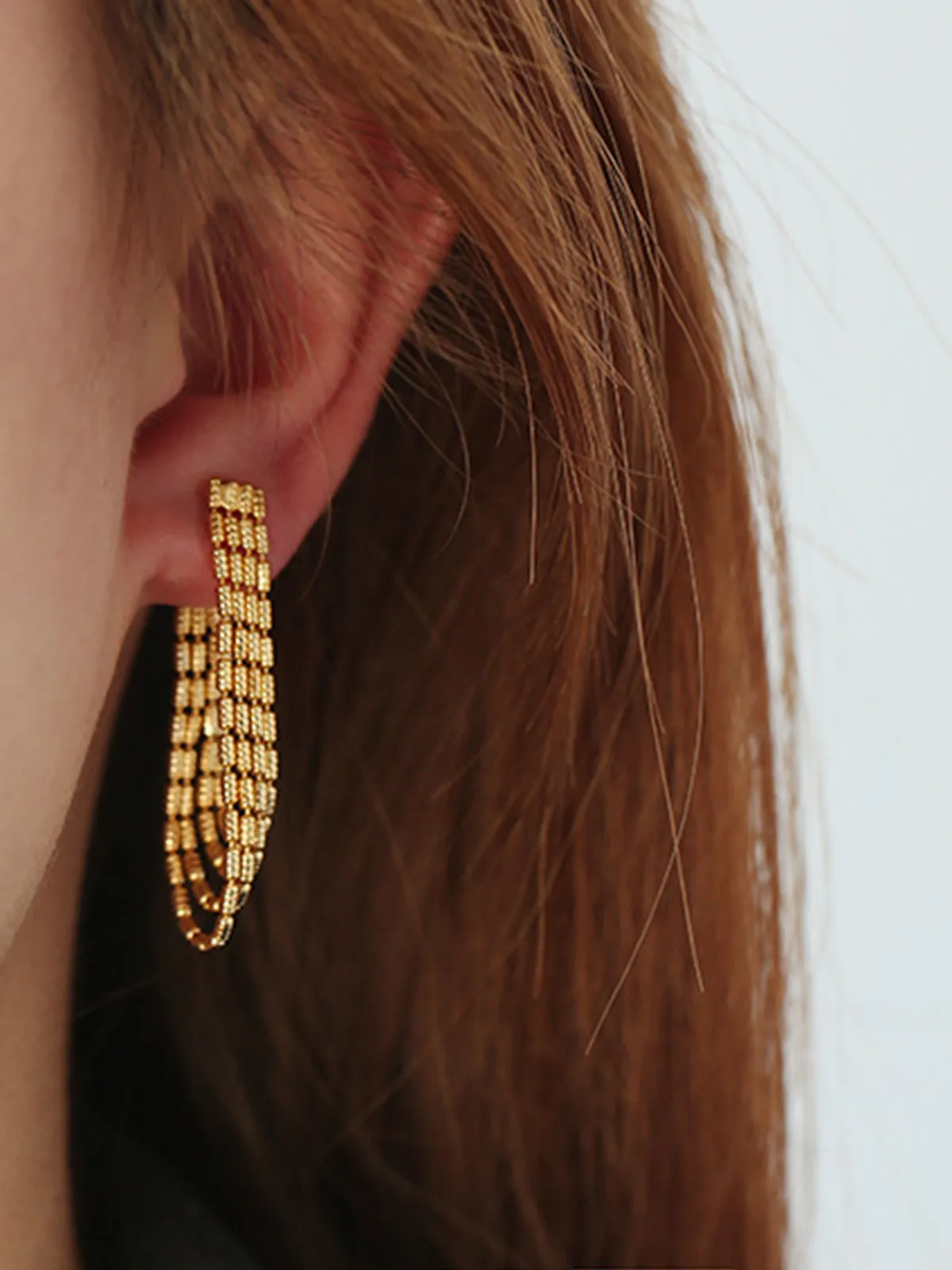 Golden Tassel Chain Drop Earrings sold by COMMENSE