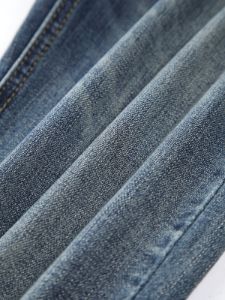 Buttoned Faded Denim Flare Jeans sold by COMMENSE