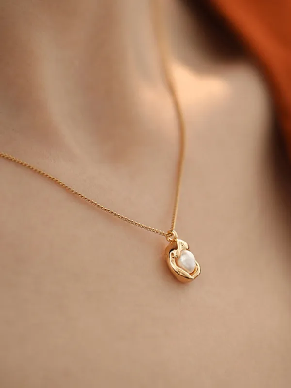 Golden Decor Pearl Pendant Necklace sold by COMMENSE