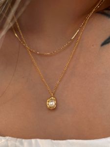 Pearl In Shell Necklace sold by COMMENSE