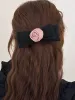 Rose Decor Bowknot Hair Clip sold by COMMENSE