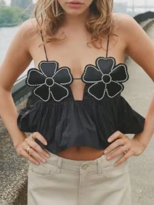 Floral Cup Ruffled Cami sold by COMMENSE