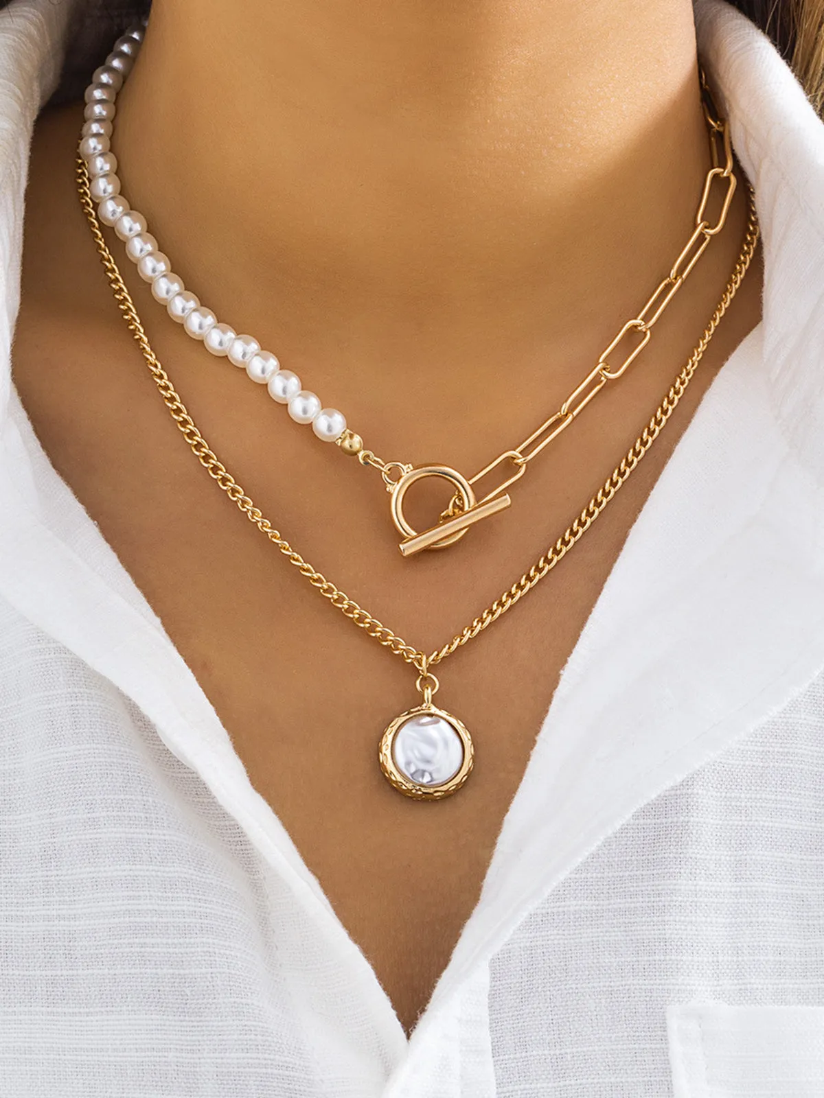Faux Pearl Disc Pendant Necklace sold by COMMENSE