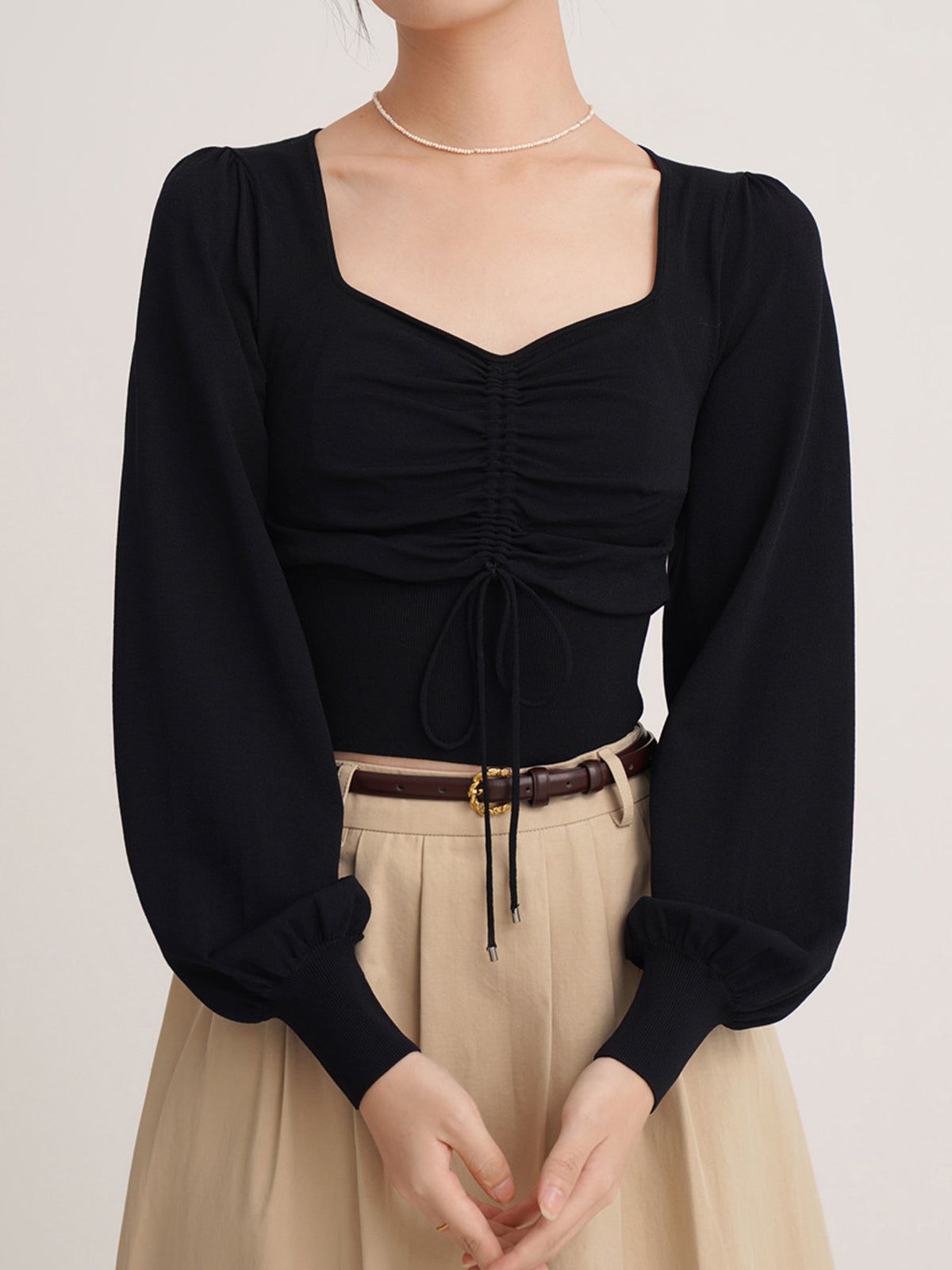 Leisurely Drawstring Puff Sleeve Knit Top sold by COMMENSE