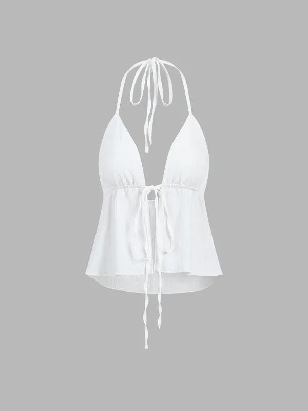 Fly Away Halter Tied Open Back Cami Top made by COMMENSE