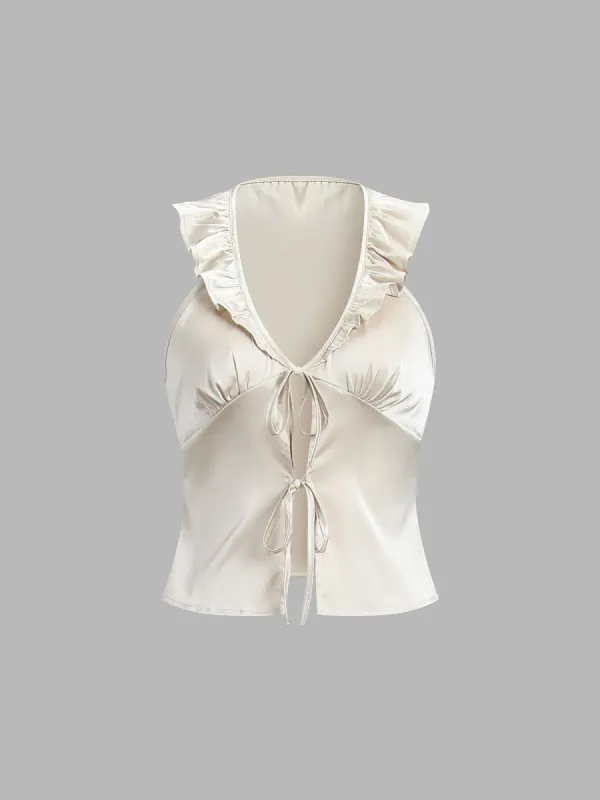 Satin Ruffle Fly Away Tied Top sold by COMMENSE