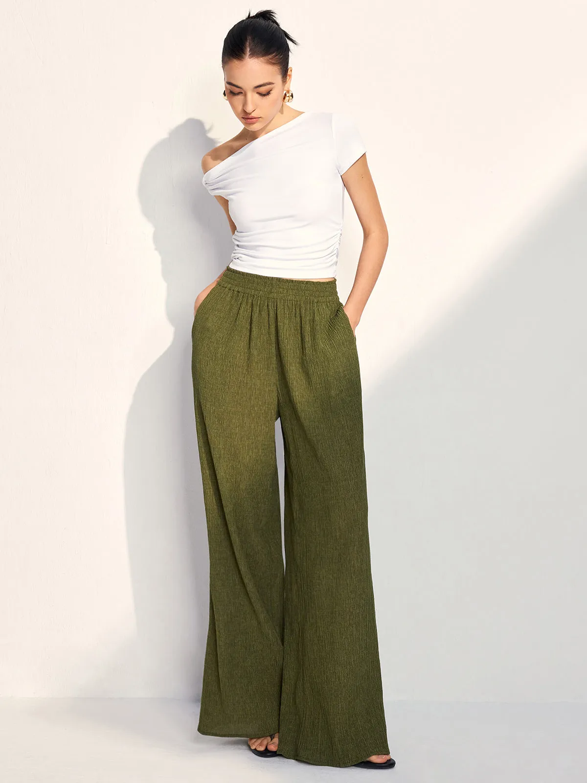 Textured Wide Leg Pants sold by COMMENSE