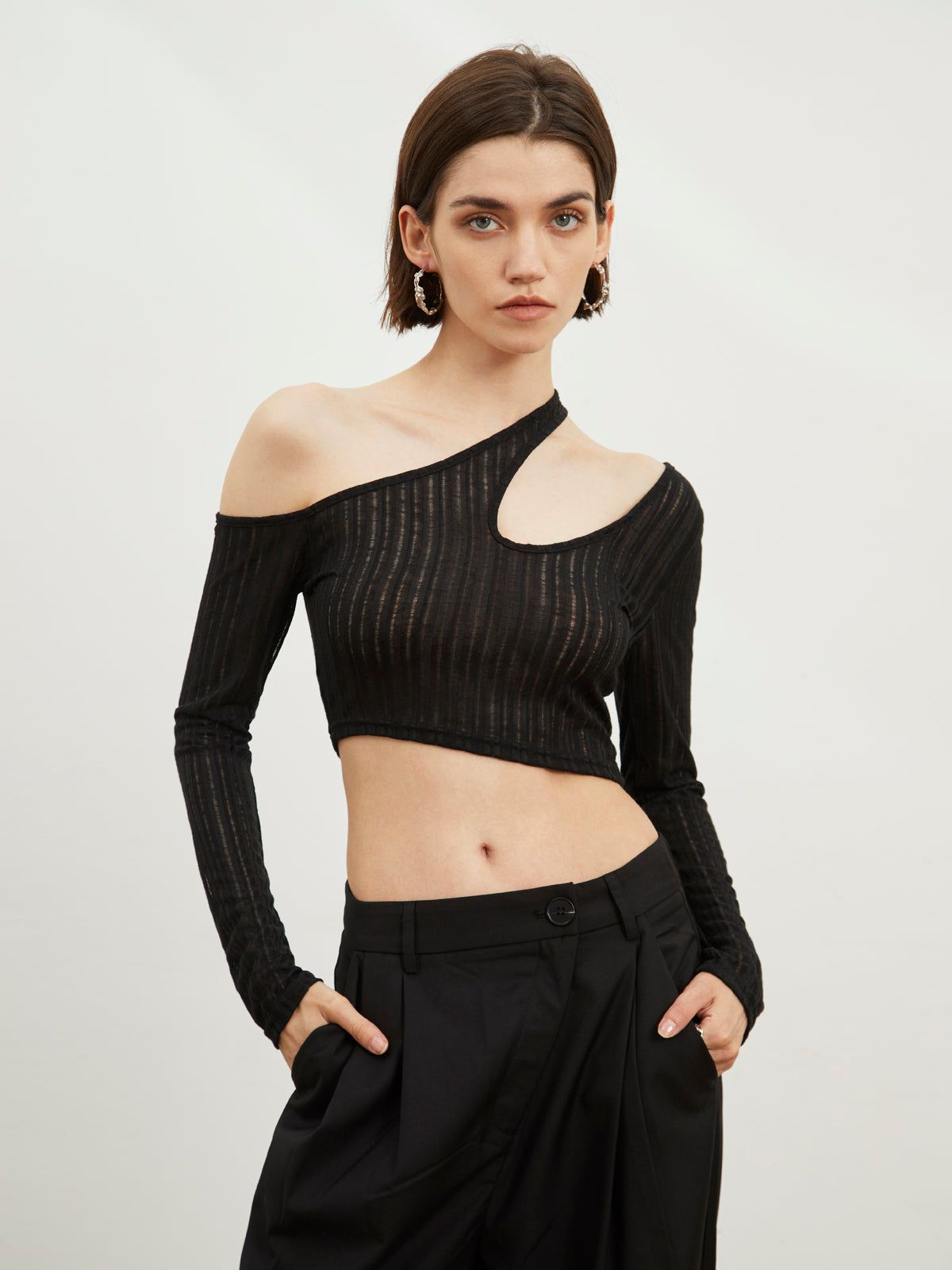 Cutout Asymmetrical Crop Top sold by COMMENSE
