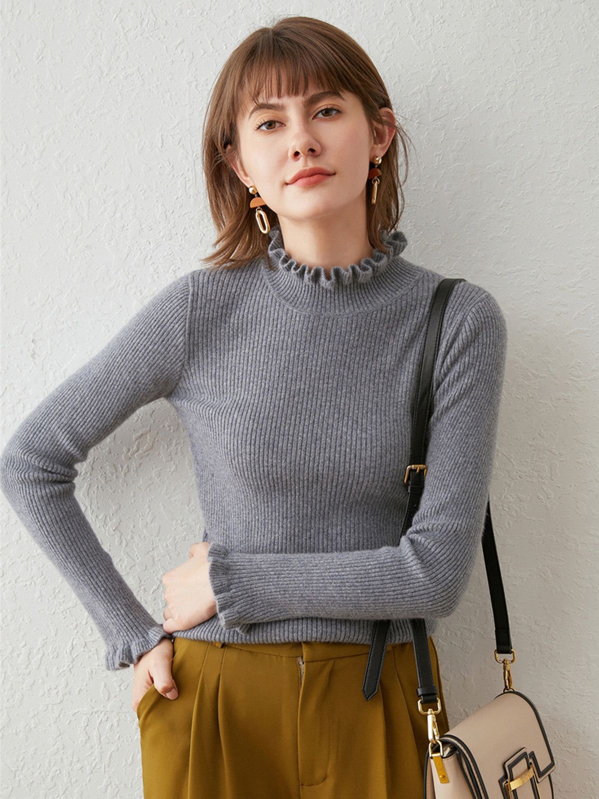 Ribbed Frilly Mockneck Knit Top sold by COMMENSE