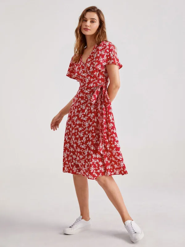 Polka Power Wrap Dress sold by COMMENSE