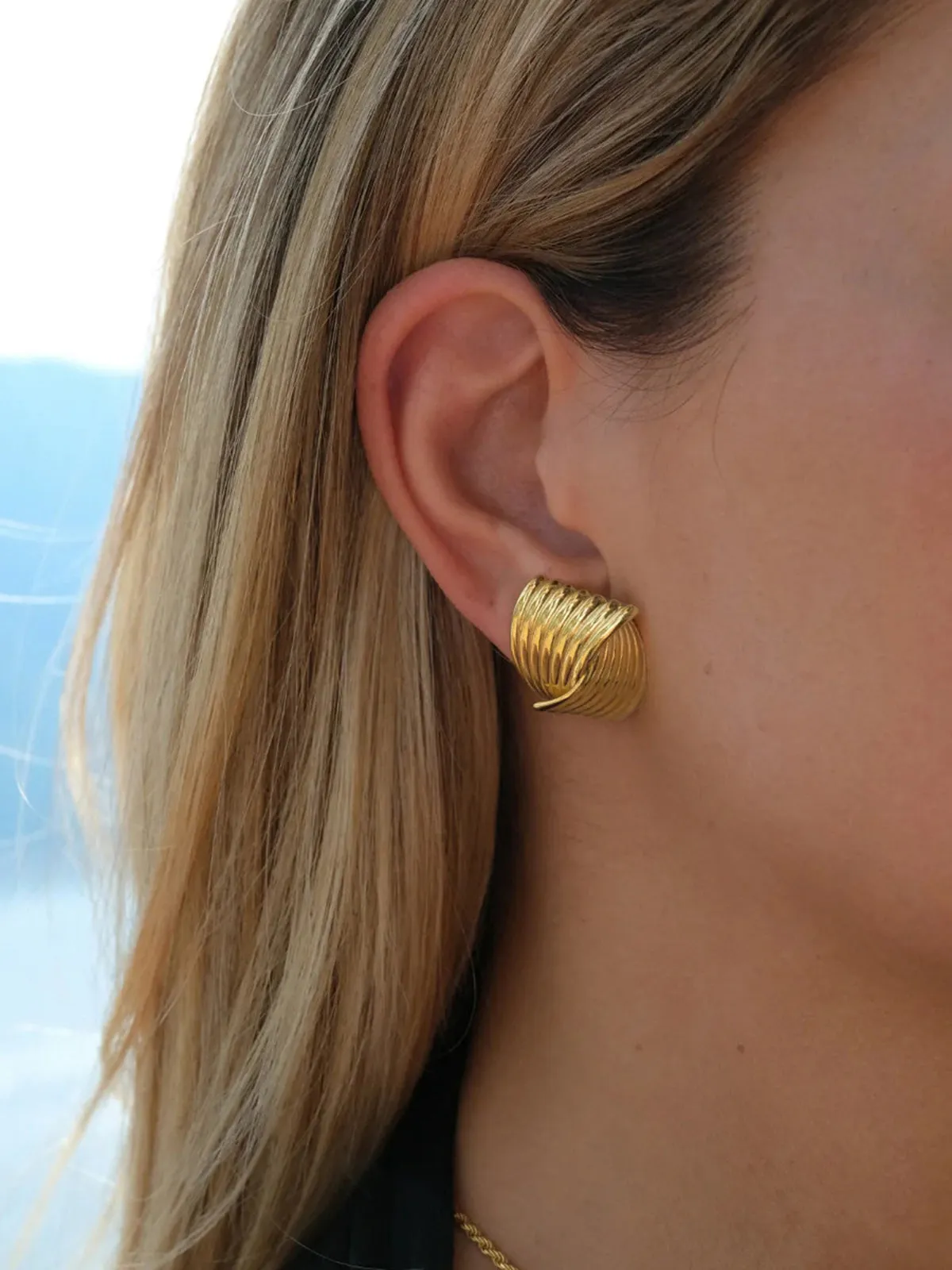Chunky Gold Twisted Earrings sold by COMMENSE