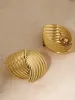 Chunky Gold Twisted Earrings sold by COMMENSE