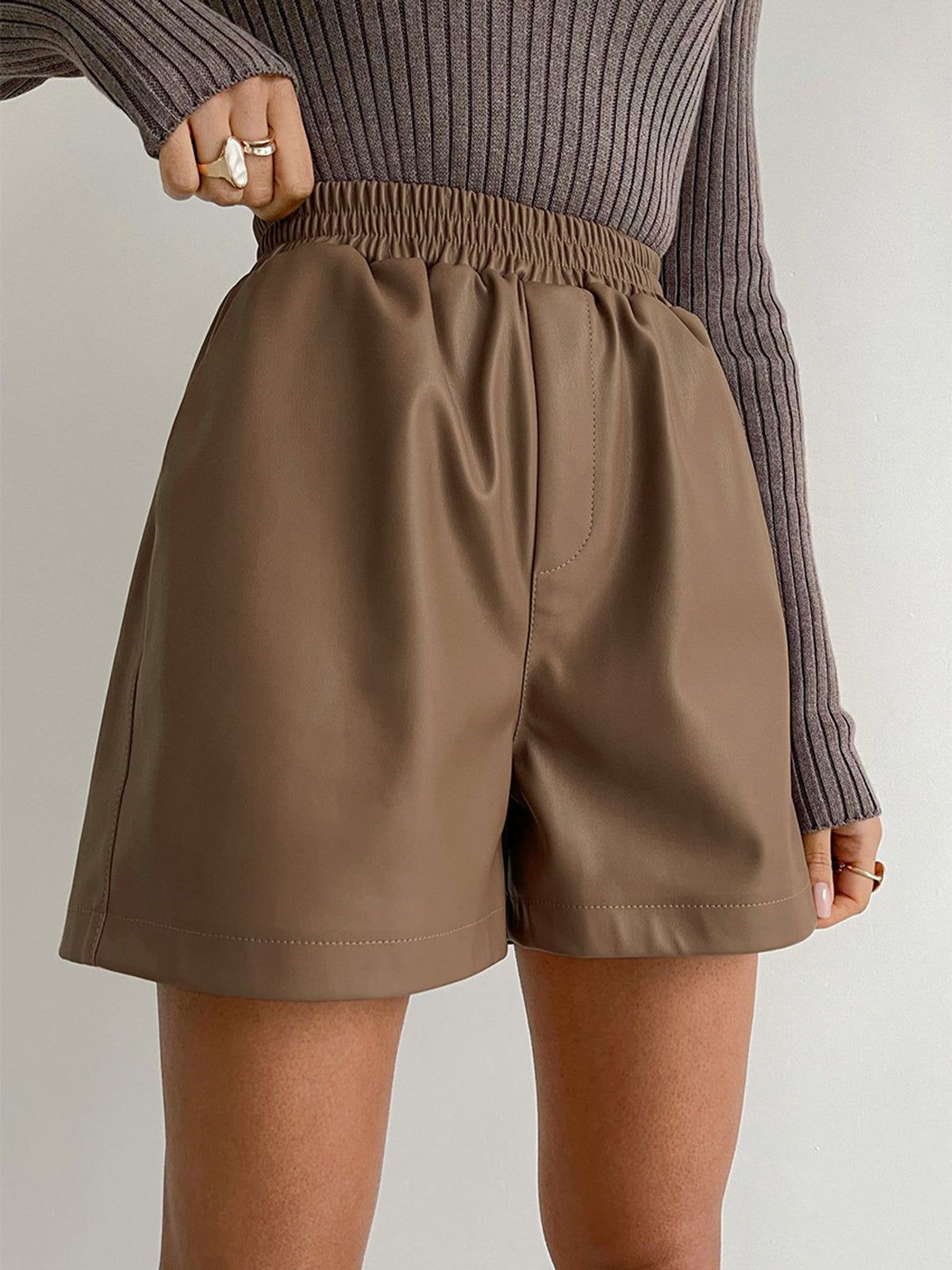 Faux Leather Shorts sold by COMMENSE