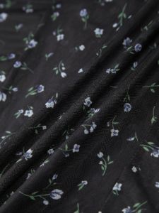 Floral Mesh Bodysuit sold by COMMENSE