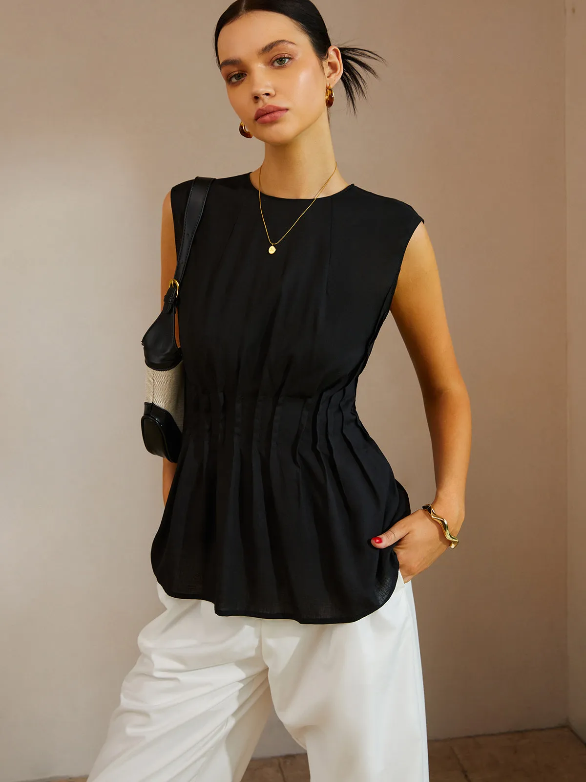 Casual Sleeveless Pleated Button Back Blouse sold by COMMENSE
