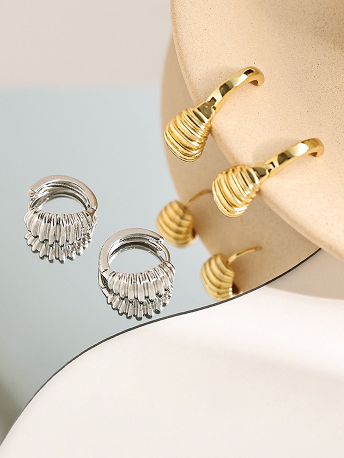 Croissant Earrings sold by COMMENSE