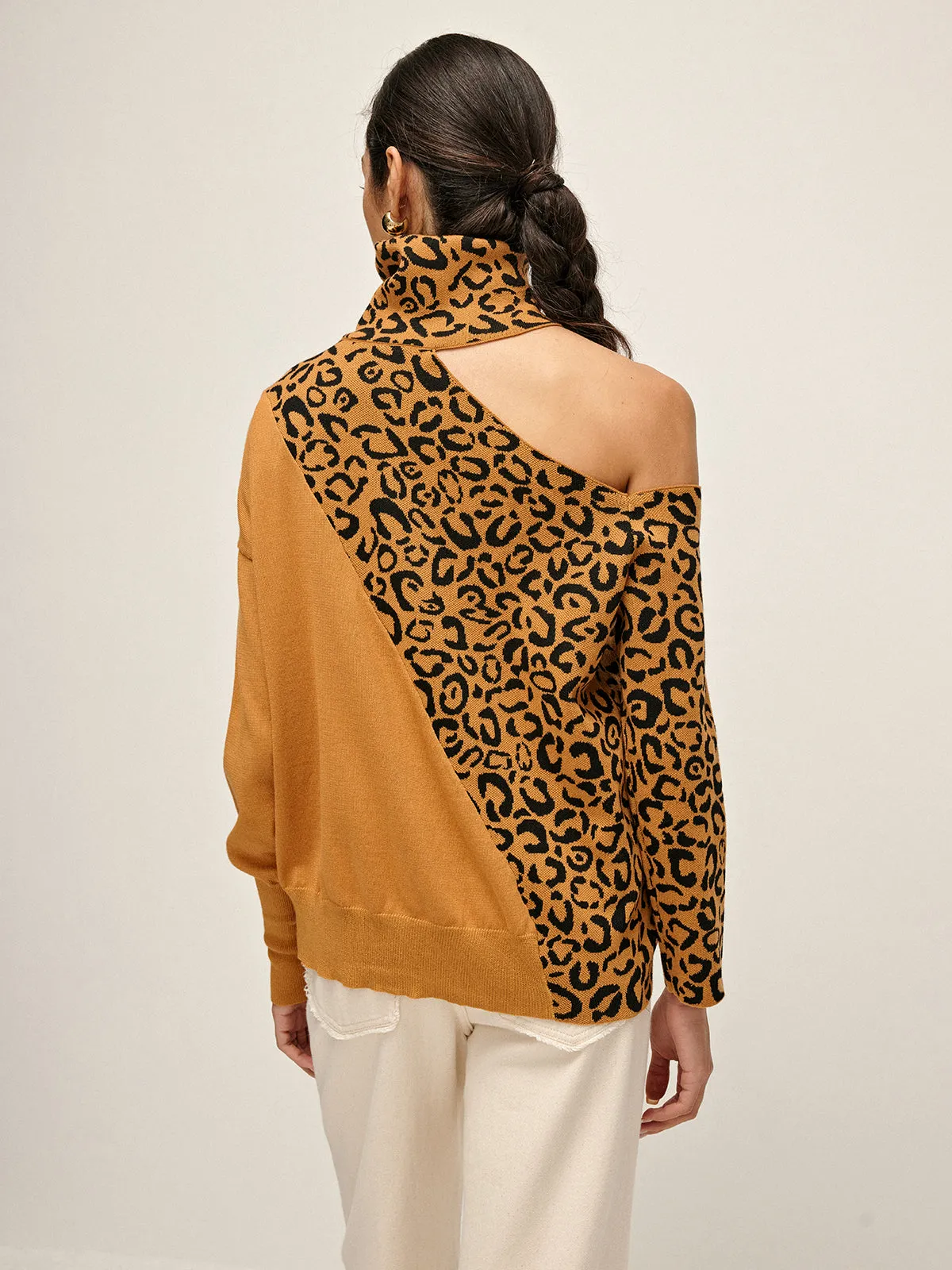 Turtleneck Cutout Leopard Patchwork Knit Top sold by COMMENSE