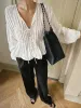 Tie-Front Pleated Blouse sold by COMMENSE