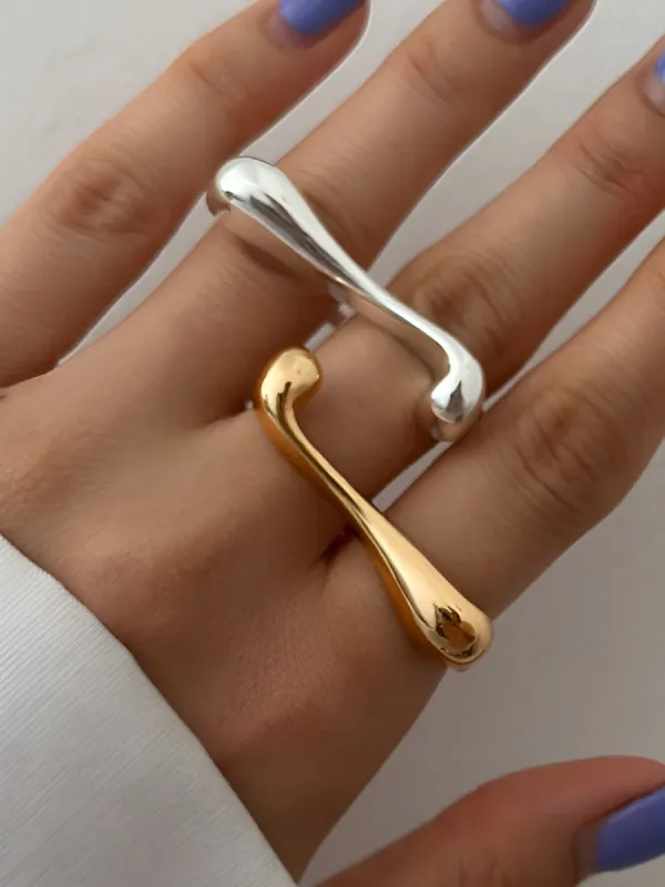 Irregular Water Drop Open Ring sold by COMMENSE