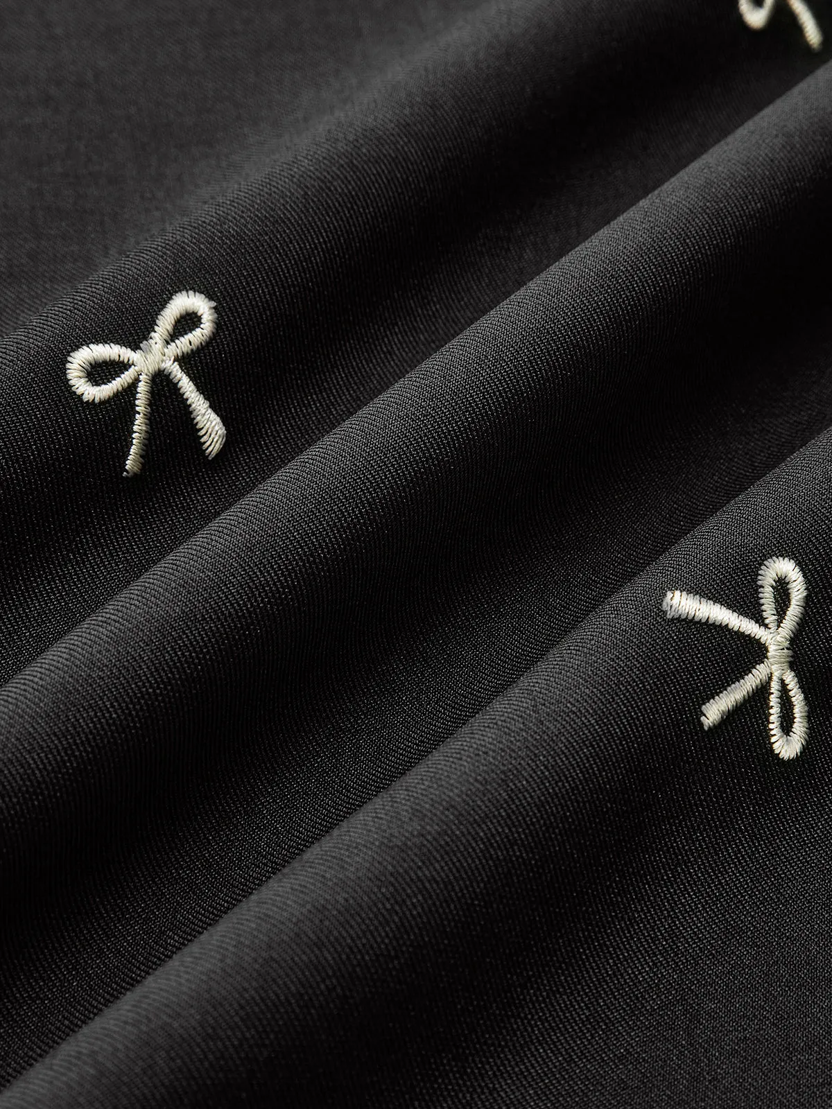 Bow Detail Zipper A Line Skirt sold by COMMENSE product image thumbnail 4