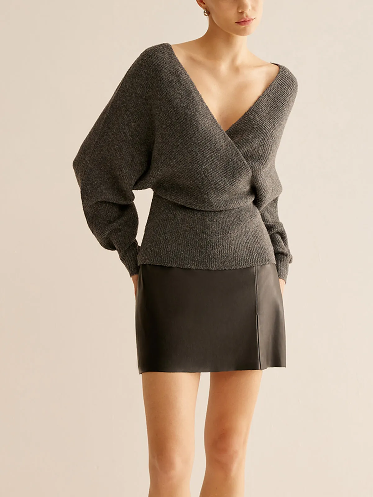 Ribbed Criss Cross Cinched Sweater sold by COMMENSE