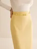 Romance Back-Split Belted Midi Skirt sold by COMMENSE