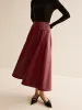 Back Zipper Pleated Faux Leather Skirt sold by COMMENSE
