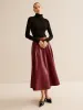 Back Zipper Pleated Faux Leather Skirt sold by COMMENSE