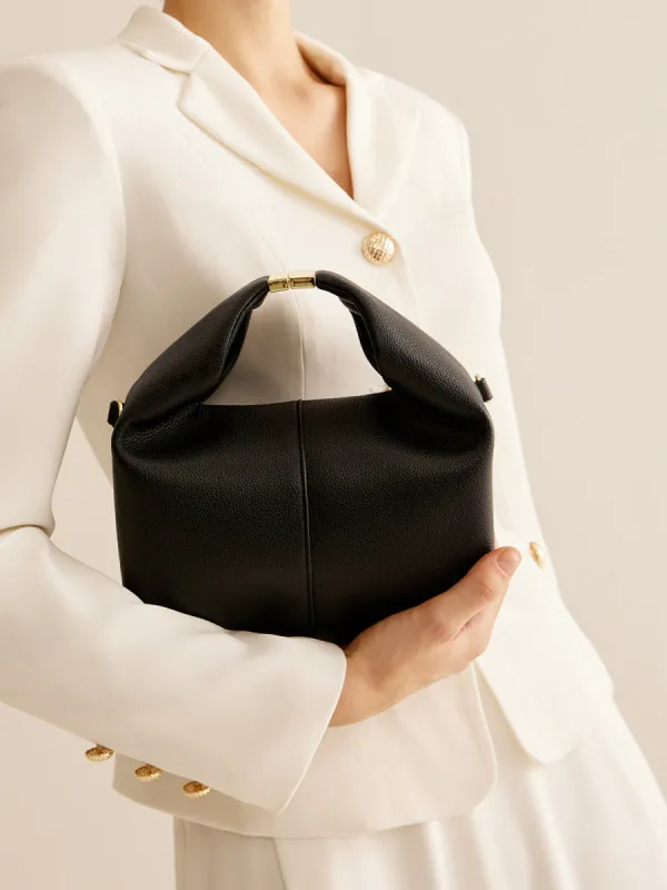Metal-Detail Top Handle Rounded Bag sold by COMMENSE